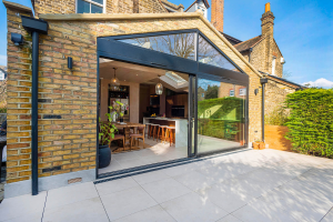 home extension design UK increasing property value modern open plan interior”