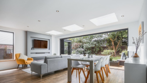 Modern single storey extension UK with open plan kitchen and garden view