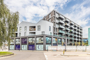 Refurbished town centre building with mixed-use layout including retail and residential in the UK