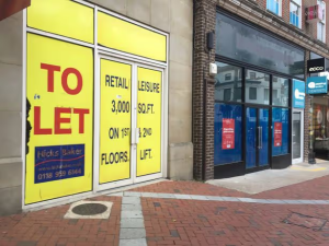 Vacant Class E unit on UK high street showing underused small commercial property