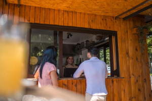Roadside unit converted into food or service use with active customers and visible frontage