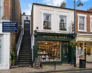 Separate access staircase to upper floor above shop showing importance of independent entrance
