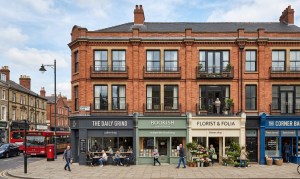 Refurbished mixed-use building with retail frontage and residential units above in the UK