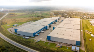 Modern warehouse facility exterior showing strong logistics and operational use